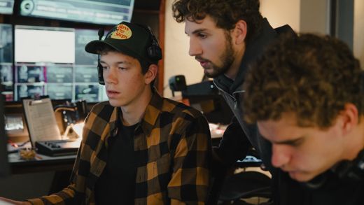 Interns in the broadcast control room during a show
